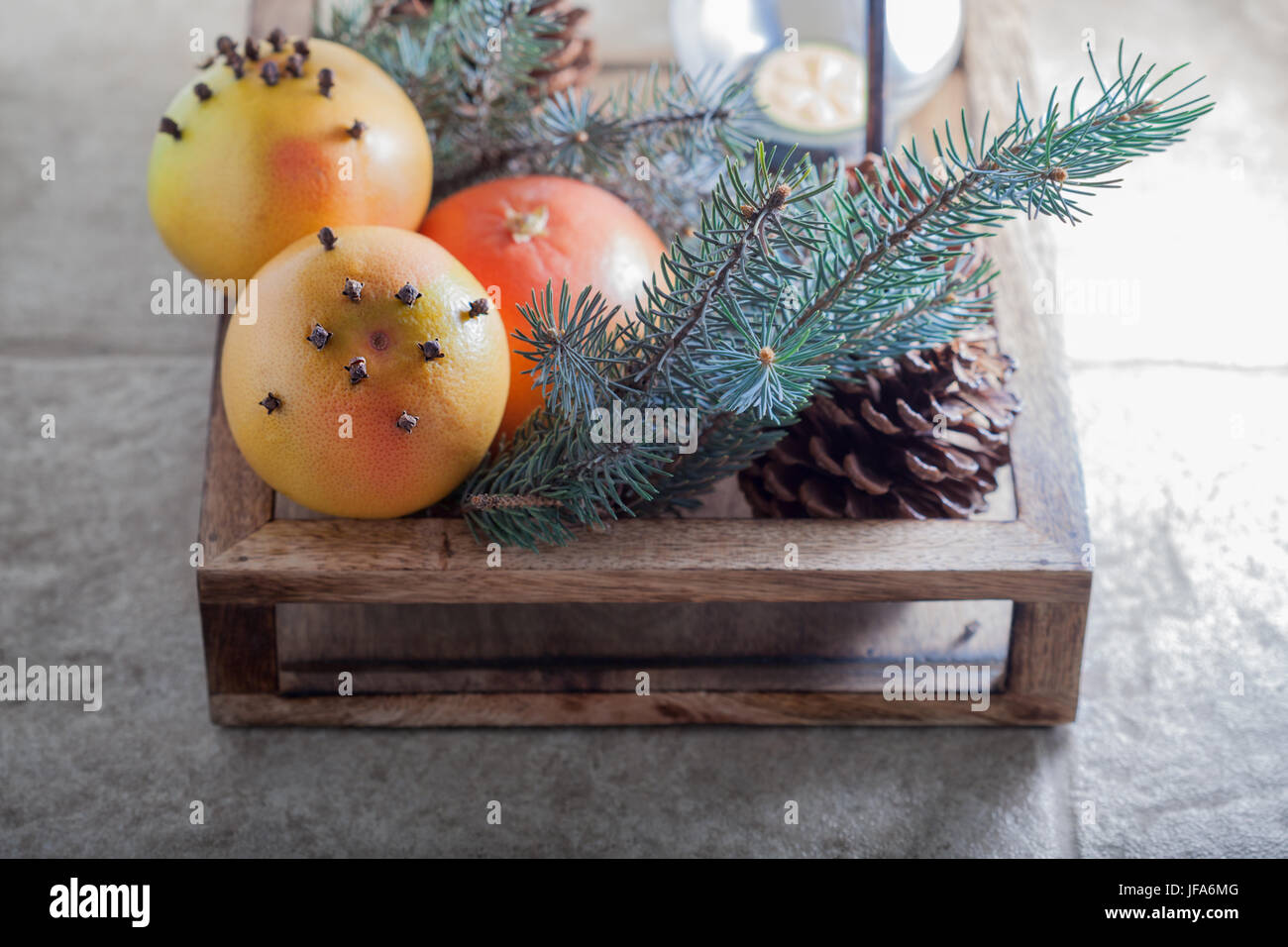 Christmas oranges in wooden box Stock Photo