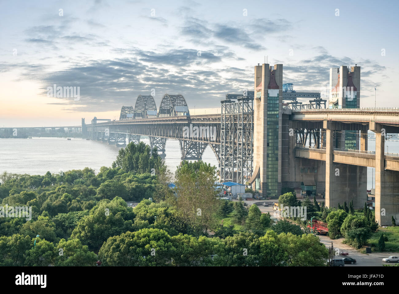 jiujiang yangtze river bridge at dusk Stock Photo