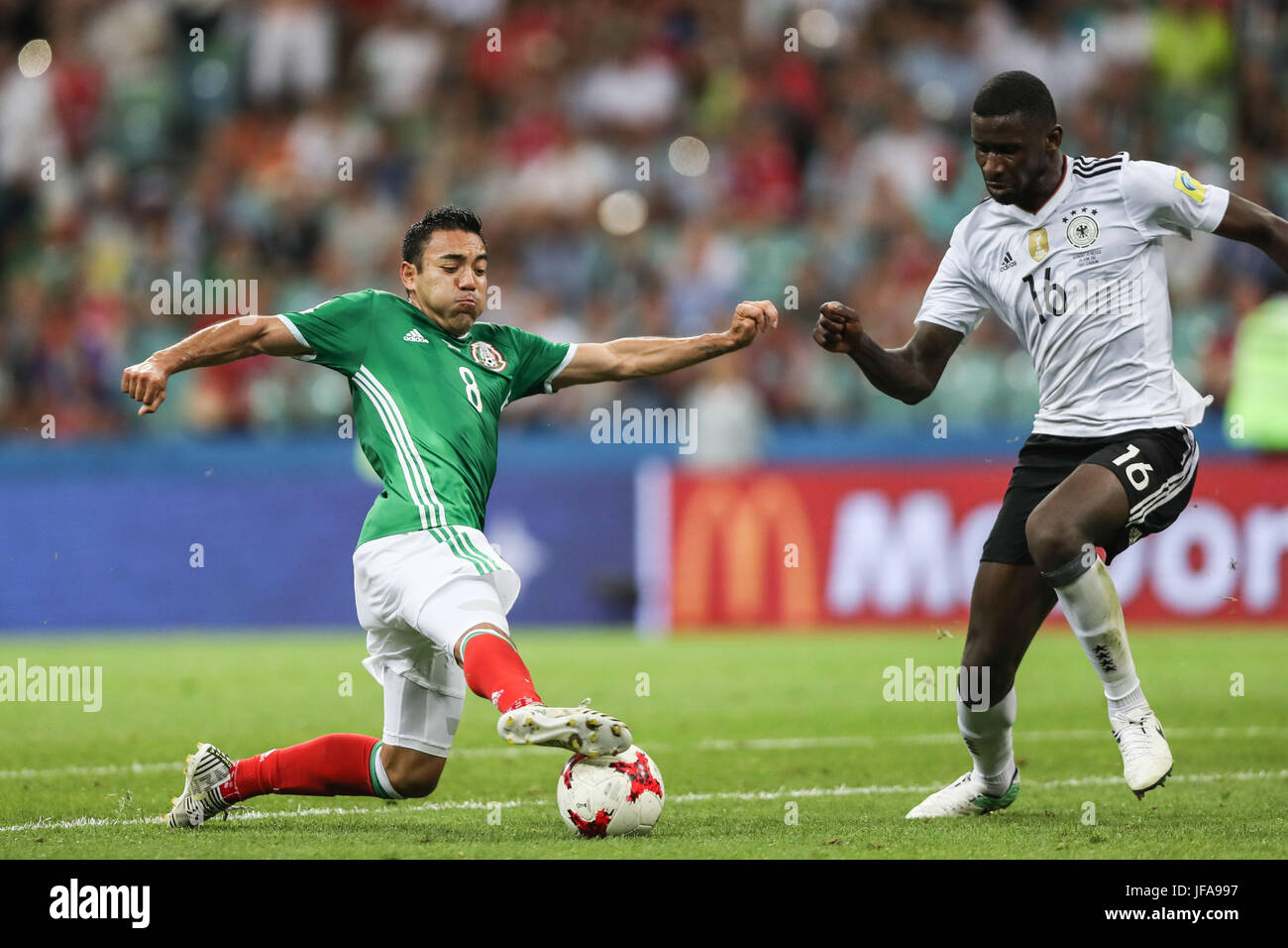 Sochi, Russia. 29th June, 2017. Marco Fabian (L) of Mexico vies with Antonio Ruediger of Germany during the semifinal match of the 2017 FIFA Confederations Cup against Germany in Sochi, Russia, June 29, 2017. Mexico lost 1-4. Credit: Wu Zhuang/Xinhua/Alamy Live News Stock Photo