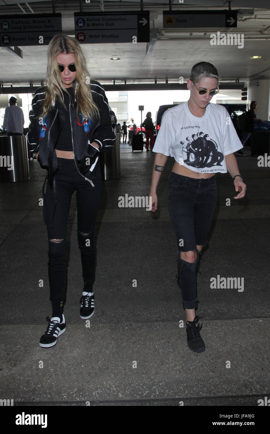 Los Angeles, Ca, USA. 29th June, 2017. Stella Maxwell and Kristen Stewart  seen at LAX in Los Angeles, California on June 29, 2017. Credit: John  Misa/Media Punch/Alamy Live News Stock Photo - Alamy