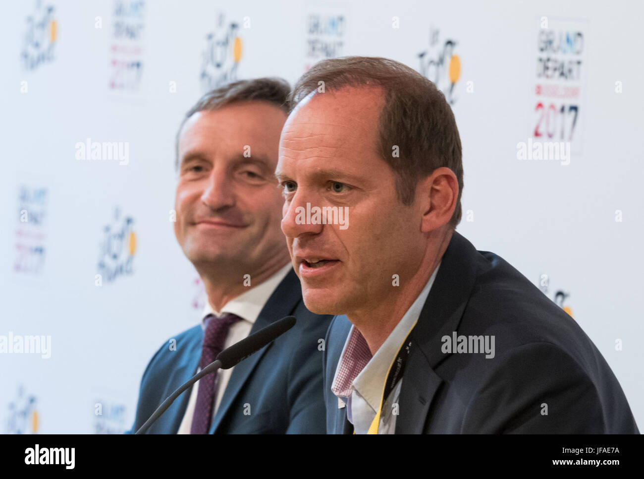 Duesseldorf, Germany. 30th June, 2017. Duesseldorf's Mayor Thomas Geisel (SPD, l) and the director of the Tour de France Christian Prudhomme, photographed during a press conference in Duesseldorf, Germany, 30 June 2017. Photo: Bernd Thissen/dpa/Alamy Live News Stock Photo