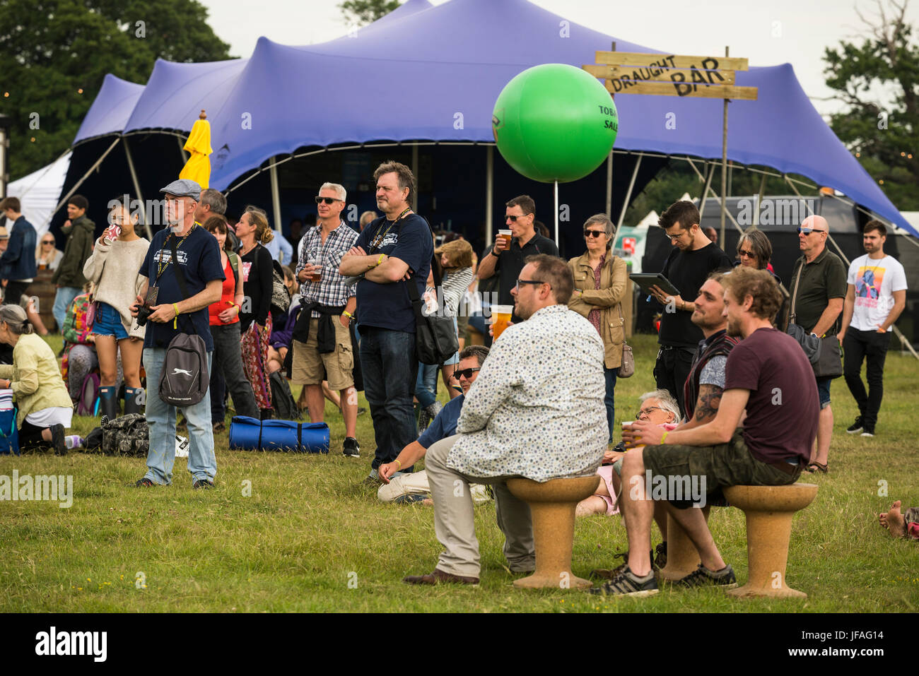 Glynde, East Sussex, 30th June 2017. Love Supreme Jazz Festival. People have arrived on site for the opening day of Love Supreme Jazz Festival at Glynde Place, in the idyllic setting of the South Downs. The festival, in its 5th consecutive year, is a sellout and set to be the biggest year yet. Weather is warm with a mix of intermittent sunshine, heavy cloud and rain showers. Stock Photo