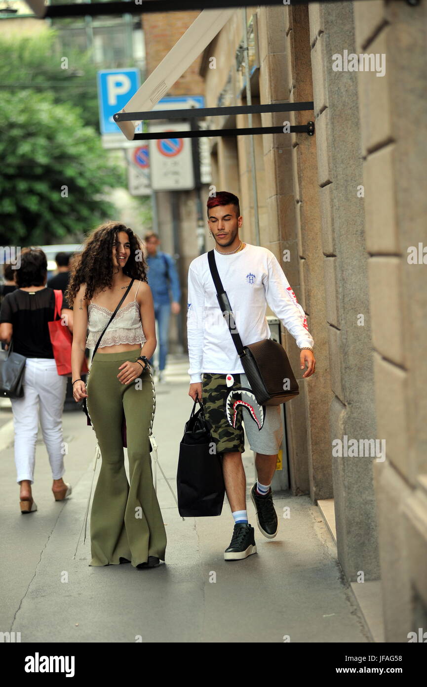 Milan, Chiara Scelsi and Sfera shopping rapper together in the center of Chiara Scelsi, the twenty-year-old Milanese model of KARL LAGERFELD who parades to Paris for Chanel, daughter of Calabrian father and Brazilian mom, comes to the center for shopping. Along with her is the rapper SFERA EBBASTA (real name Gionata Boschetti born in Cinisello Balsamo in 1992) with whom she strolls on Via Montenapoleone, and some boys and girls recognize him and ask him for a photo memory he gives to everyone. Chiara Scelsi and Sfera continue their walk, then, after seeing the photographers, they surprise, jok Stock Photo