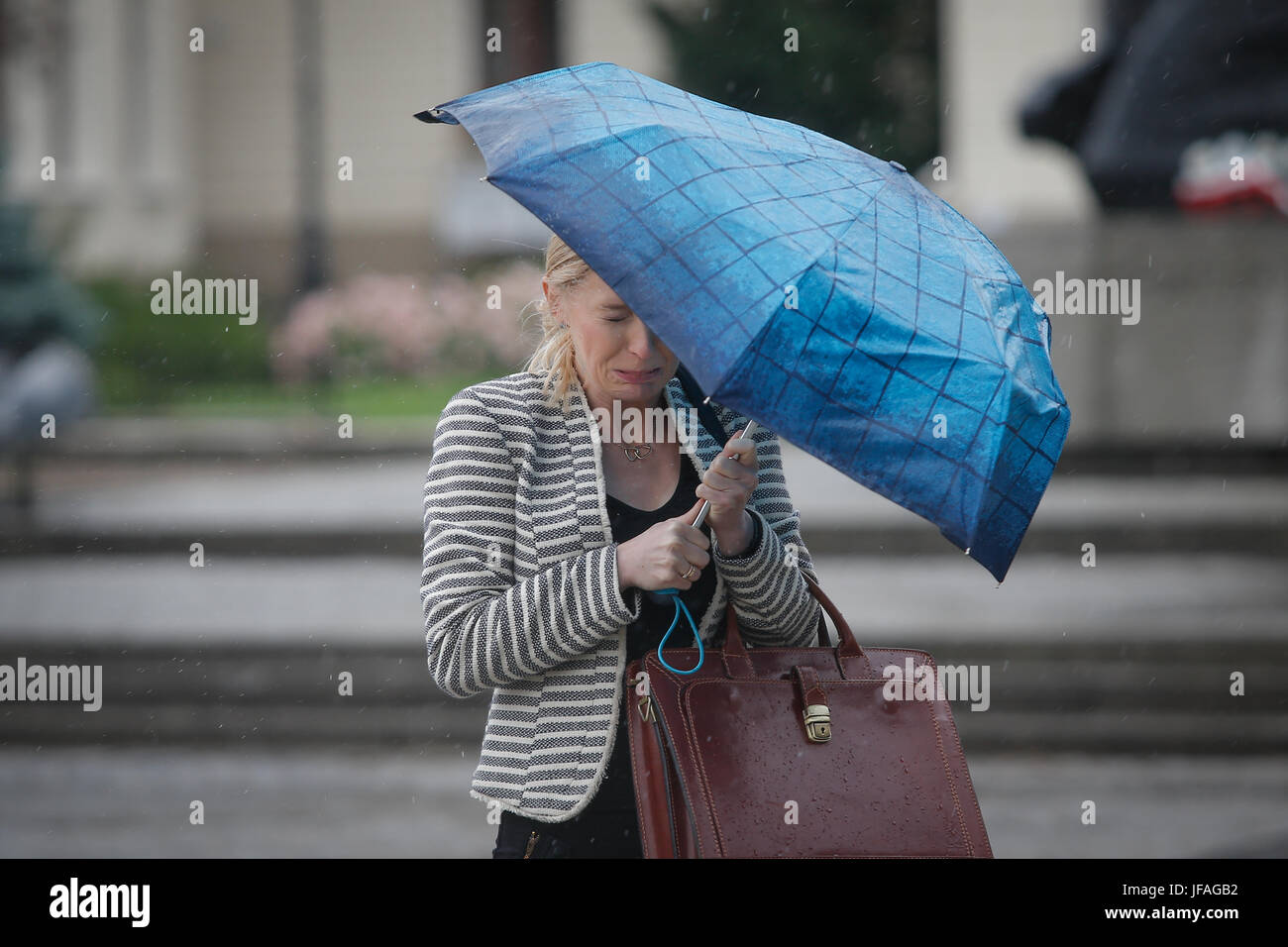 Wind gust woman hi-res stock photography and images - Alamy