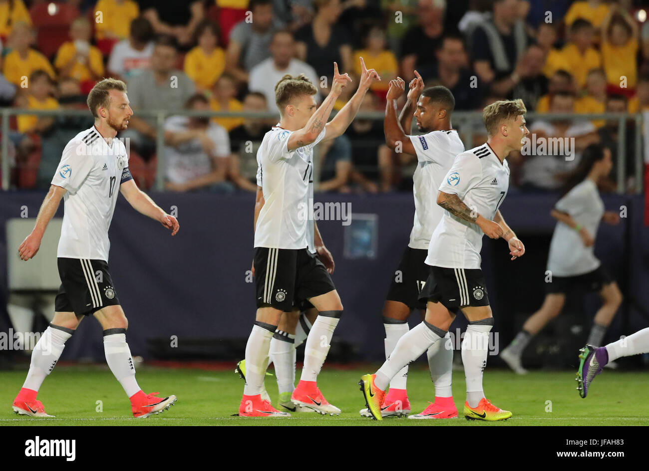 Germany's Mitchell Weiser (2nd l) celebrates his 1:0 goal with Maximilian Arnold (l), Serge Gnabry (2nd r) and Max Meyer (l) during the UEFA European Under-21 Championship soccer match between Germany and Spain at the Krakow Stadium in Krakow, Poland, 30 June 2017. Photo: Jan Woitas/dpa-Zentralbild/dpa Stock Photo