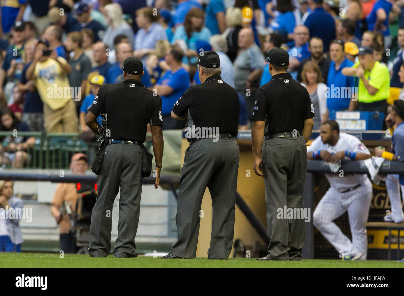 Milwaukee, WI, USA. 30th June, 2017. First base umpire Joe West #22 was hit in the head with a baseball thrown from the crowd in the Major League Baseball game between the Milwaukee Brewers and the Miami Marlins at Miller Park in Milwaukee, WI. John Fisher/CSM/Alamy Live News Stock Photo