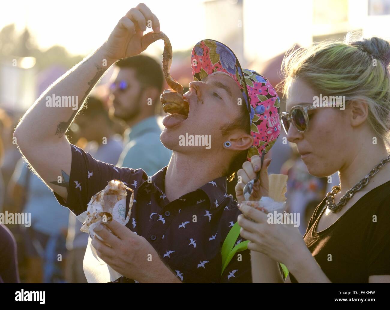 Arcadia, California, USA. 30th June, 2017. People enjoy the food at the '626 Night Market' on June 30, 2017 in Arcadia, California, an event that attracts all generations of the Chinese American community and showcases many San Gabriel Valley food vendors. Credit: Ringo Chiu/ZUMA Wire/Alamy Live News Stock Photo