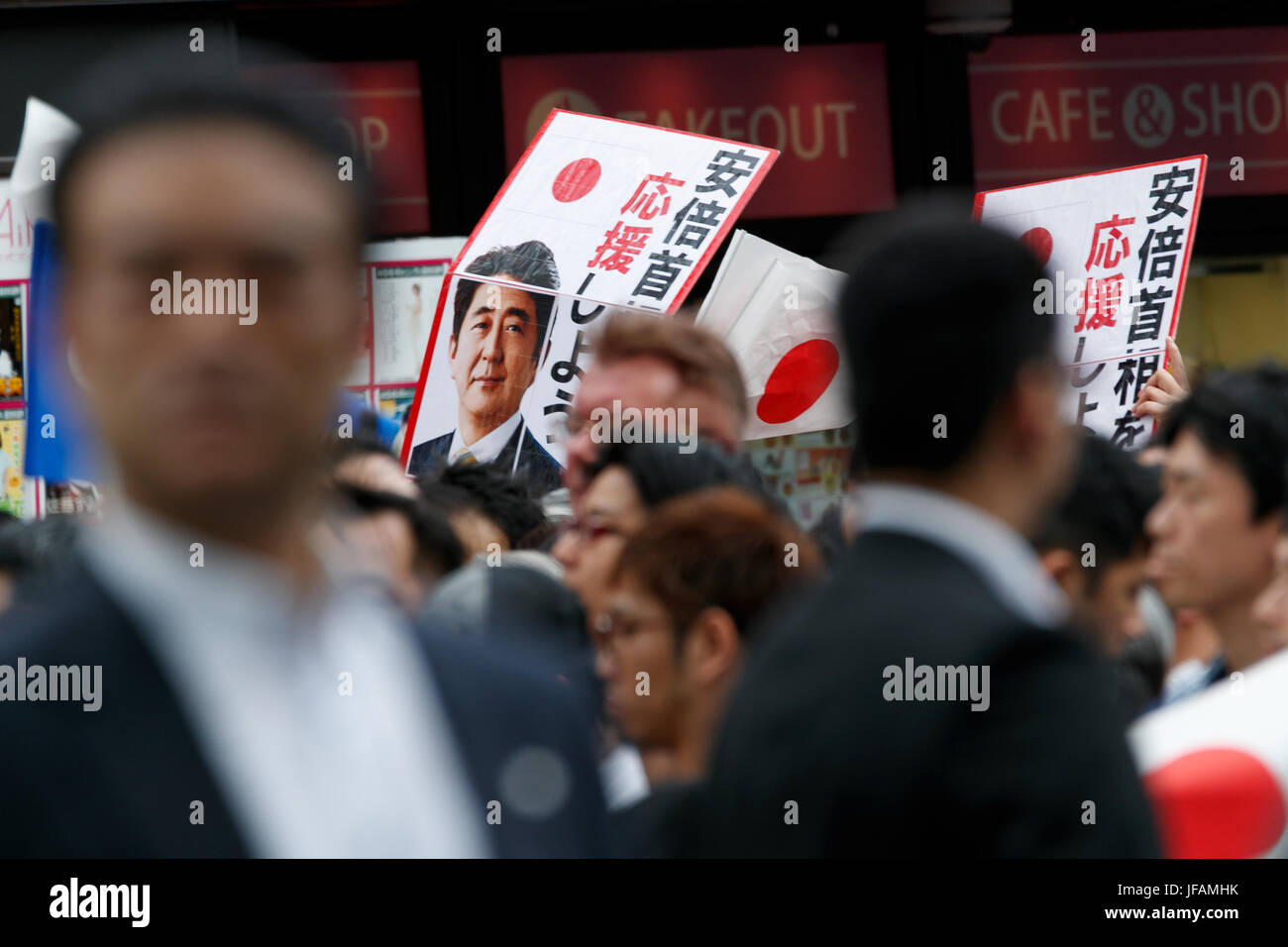Tokyo, Japan. 1st July, 2017. Anti-Abe protesters appear during a campaign event of the Liberal Democratic Party of Japan for tomorrow's Tokyo Metropolitan Assembly election on July 1, 2017, Tokyo, Japan. A group of anti-Abe protesters appeared holding placards and chanting against the Prime Minister during the campaign event in support of LDP party candidate Aya Nakamura. Credit: Rodrigo Reyes Marin/AFLO/Alamy Live News Stock Photo
