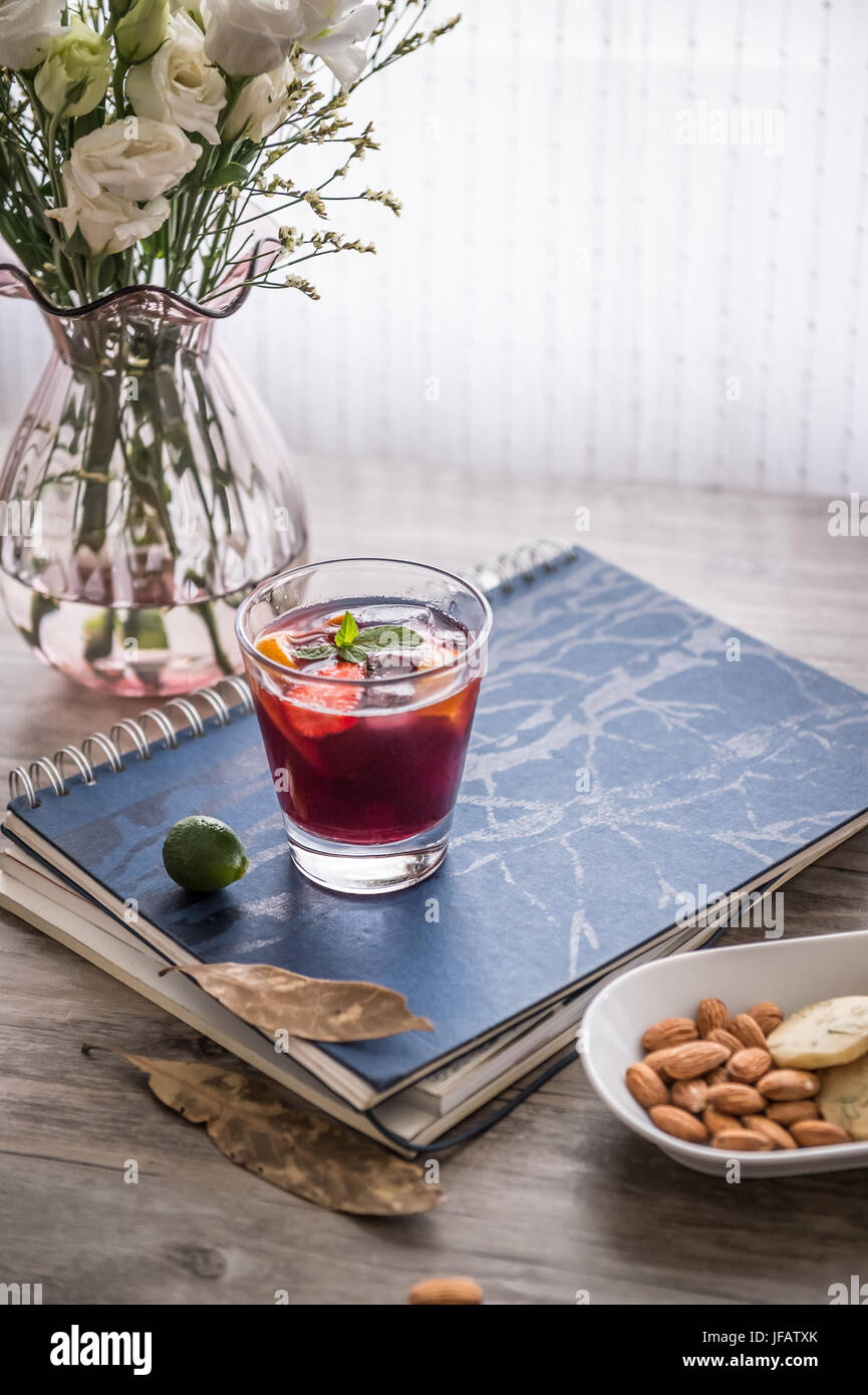 Desktop flowers and glass Stock Photo - Alamy