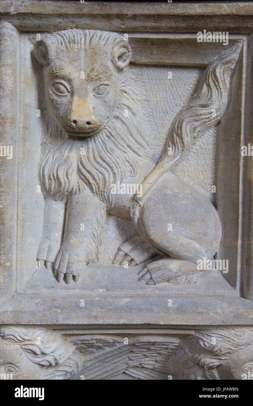 Carved stone lion baptismal font, Church of Saint Gregory, Rendlesham, Suffolk, England, UK Stock Photo