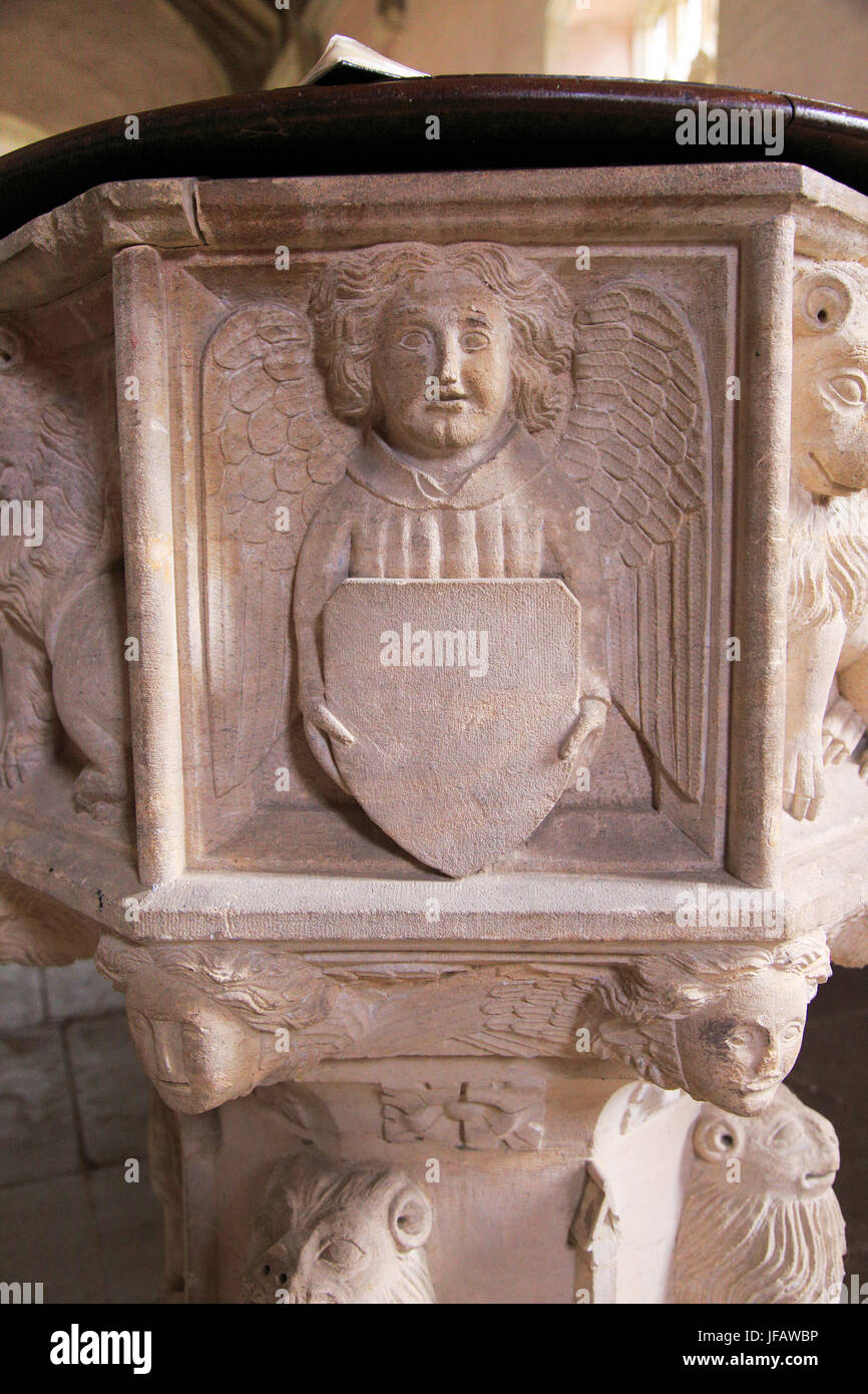 Carved stone angel baptismal font, Church of Saint Gregory, Rendlesham, Suffolk, England, UK Stock Photo