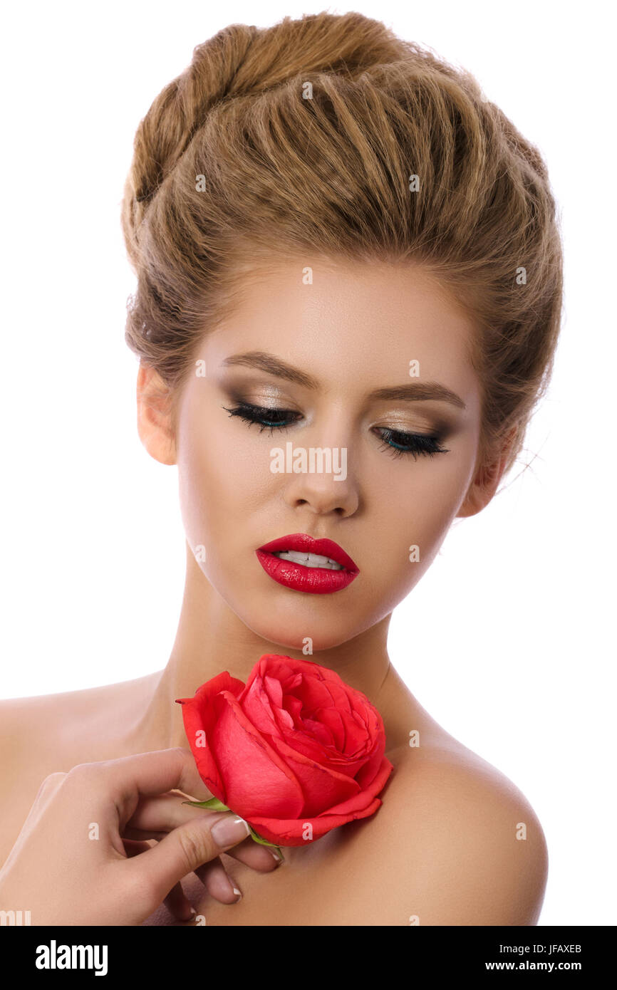 Beauty portrait of young beautiful woman holding red rose isolated on ...