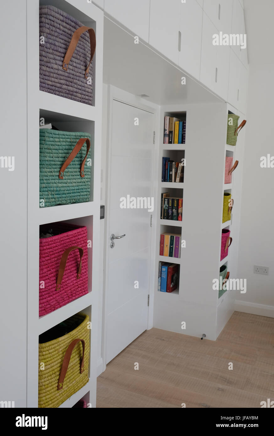 Basket storage in bedroom Stock Photo Alamy