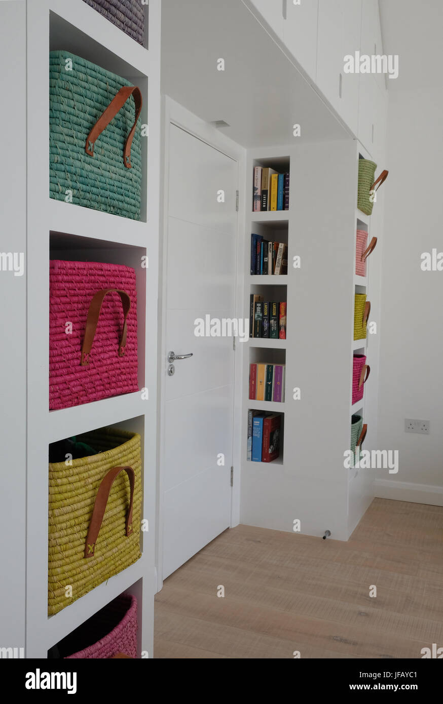 Basket storage in bedroom Stock Photo Alamy