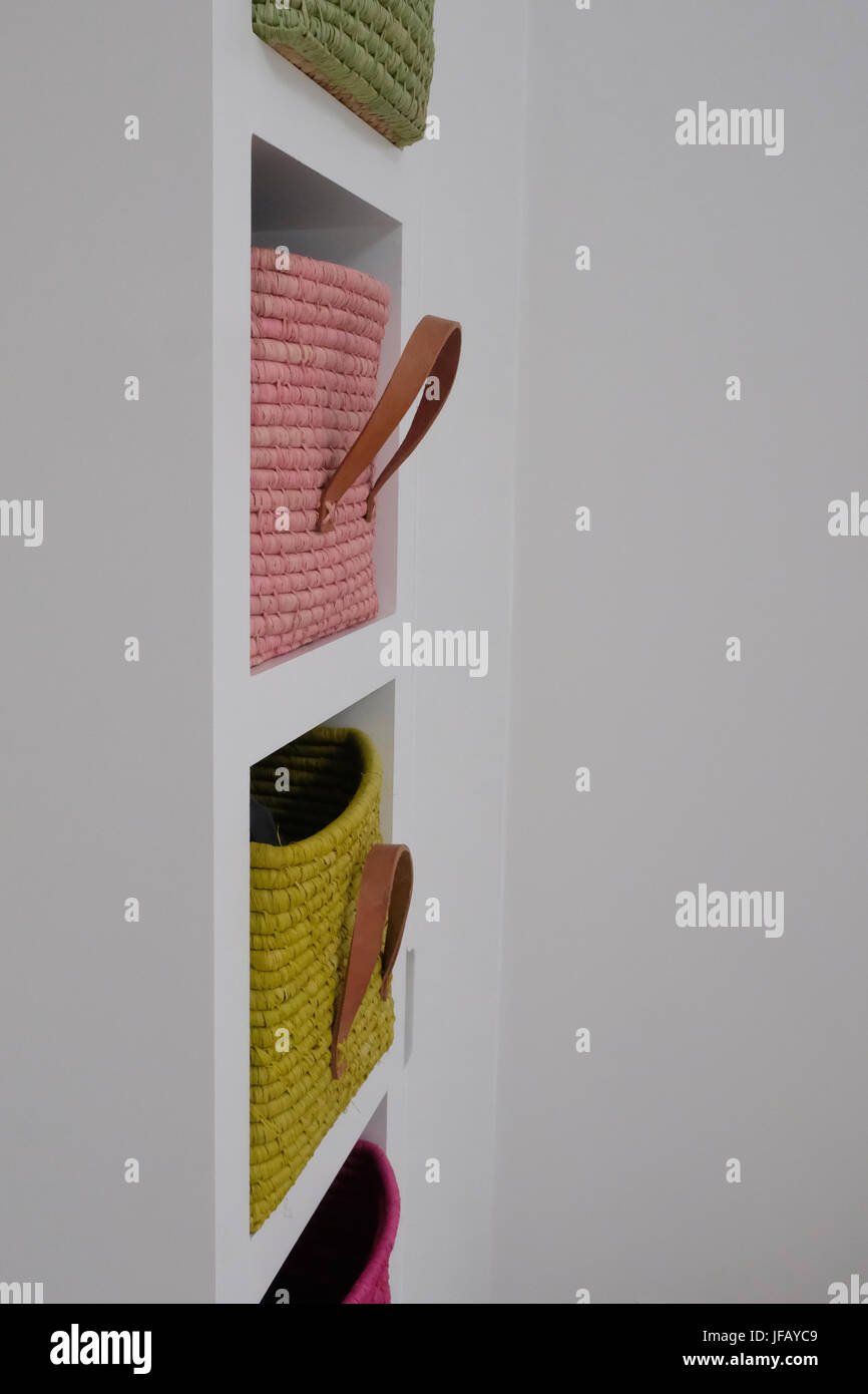 Basket storage in bedroom Stock Photo Alamy