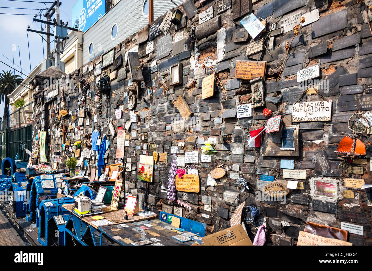 SANTIAGO, CHILE - OCTOBER 28, 2016: A place of street prayer made up of a dozen templates (hermitages) L' Animita de Romualdito.This is the most famou Stock Photo