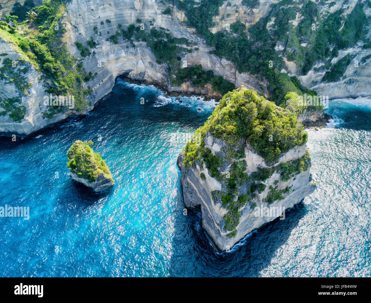 Aerial View of small islands near the Atuh Raja Lima lookout point on the island of Nusa Penida, near Bali, Indonesia. Stock Photo