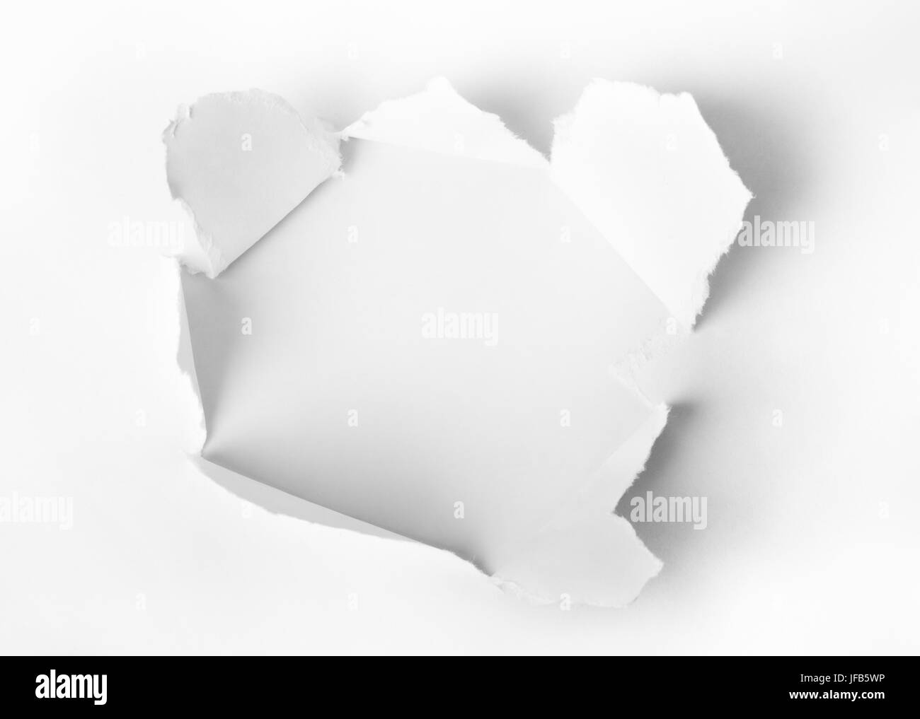 Hole punched hi-res stock photography and images - Alamy