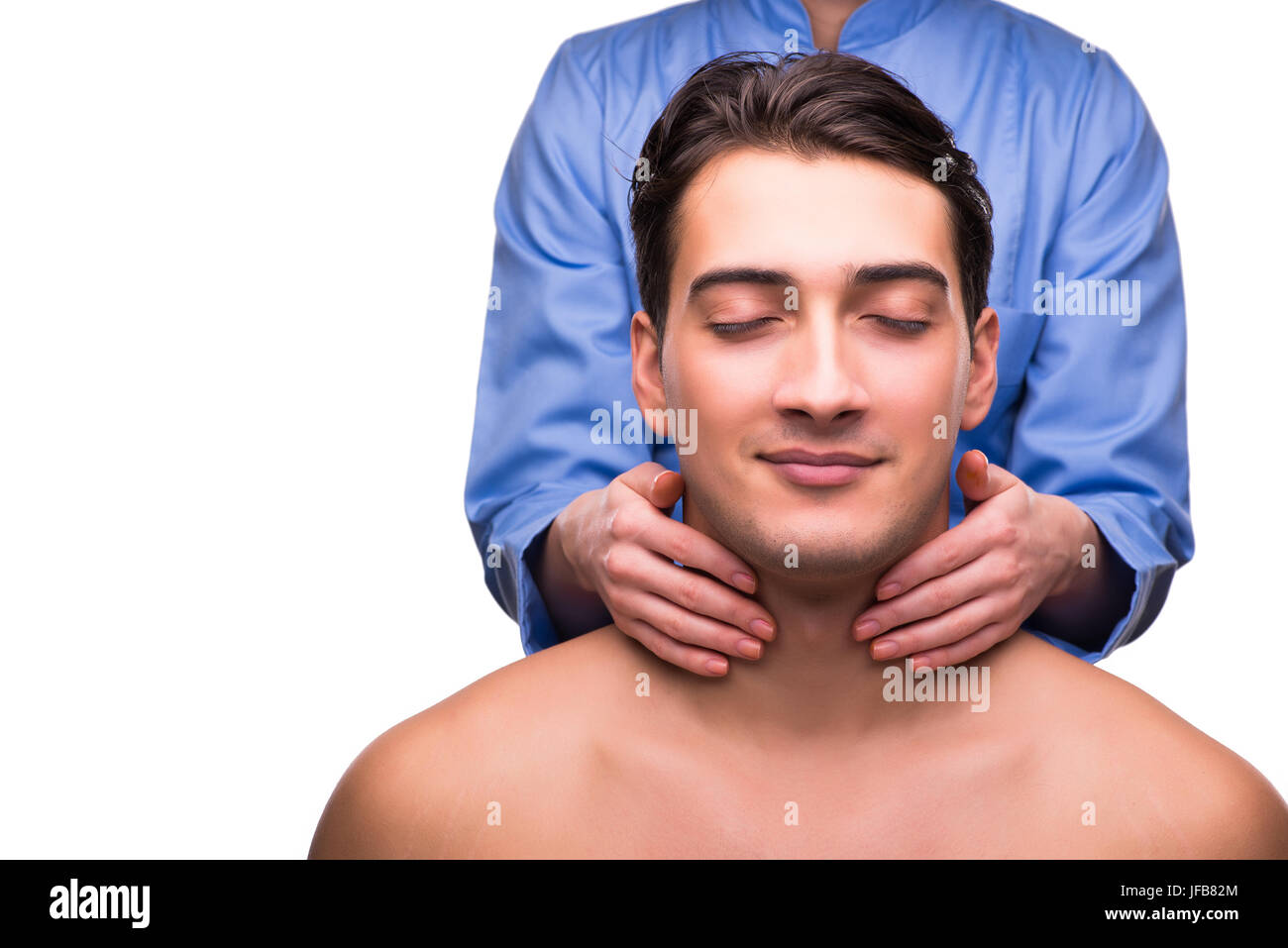 Man during massage session isolated on white Stock Photo Alamy