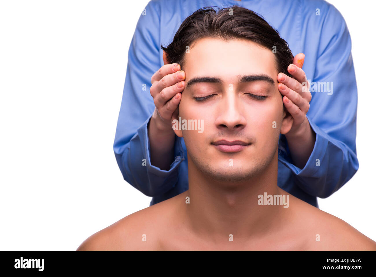 Man during massage session isolated on white Stock Photo Alamy