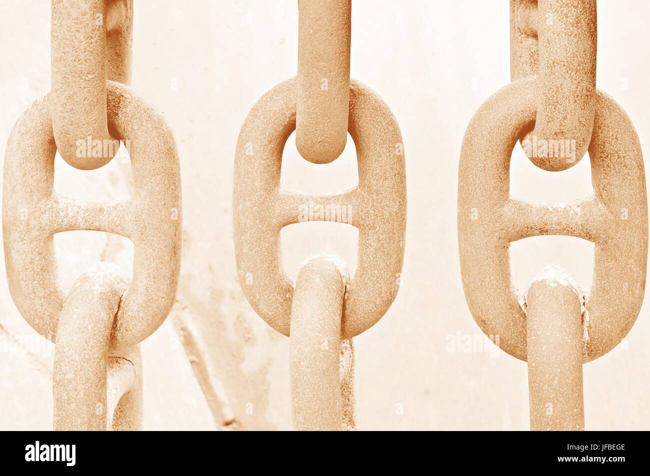 Chains hanging side by side, Stock Photo