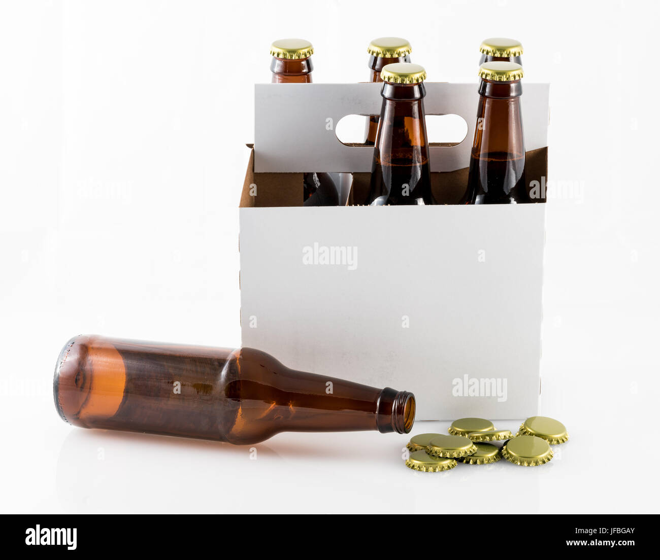 Five bottles of beer in cardboard carrier Stock Photo Alamy
