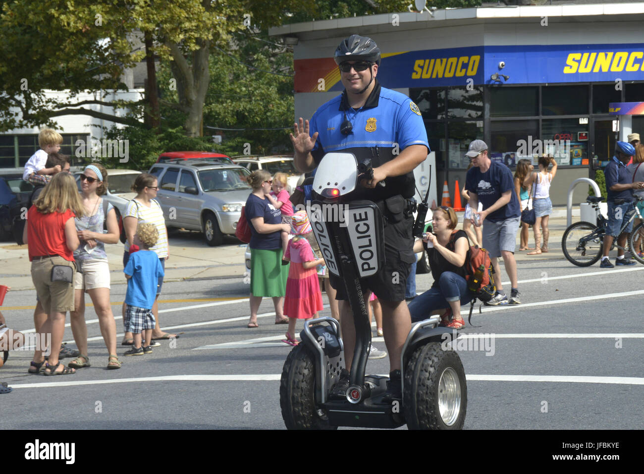 Policeman patrols on a segway Stock Photo