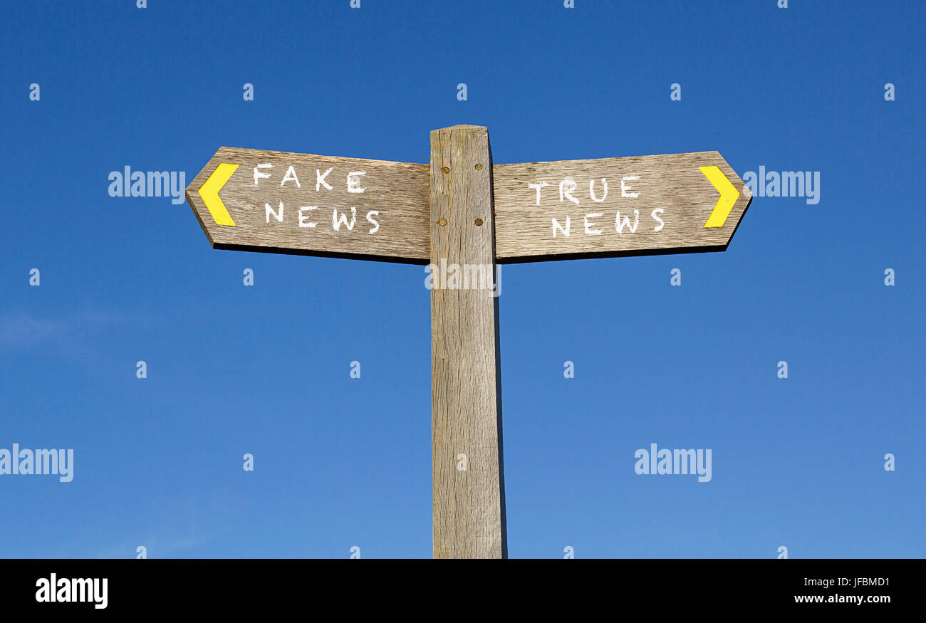 Conceptual Signpost - Fake News Stock Photo