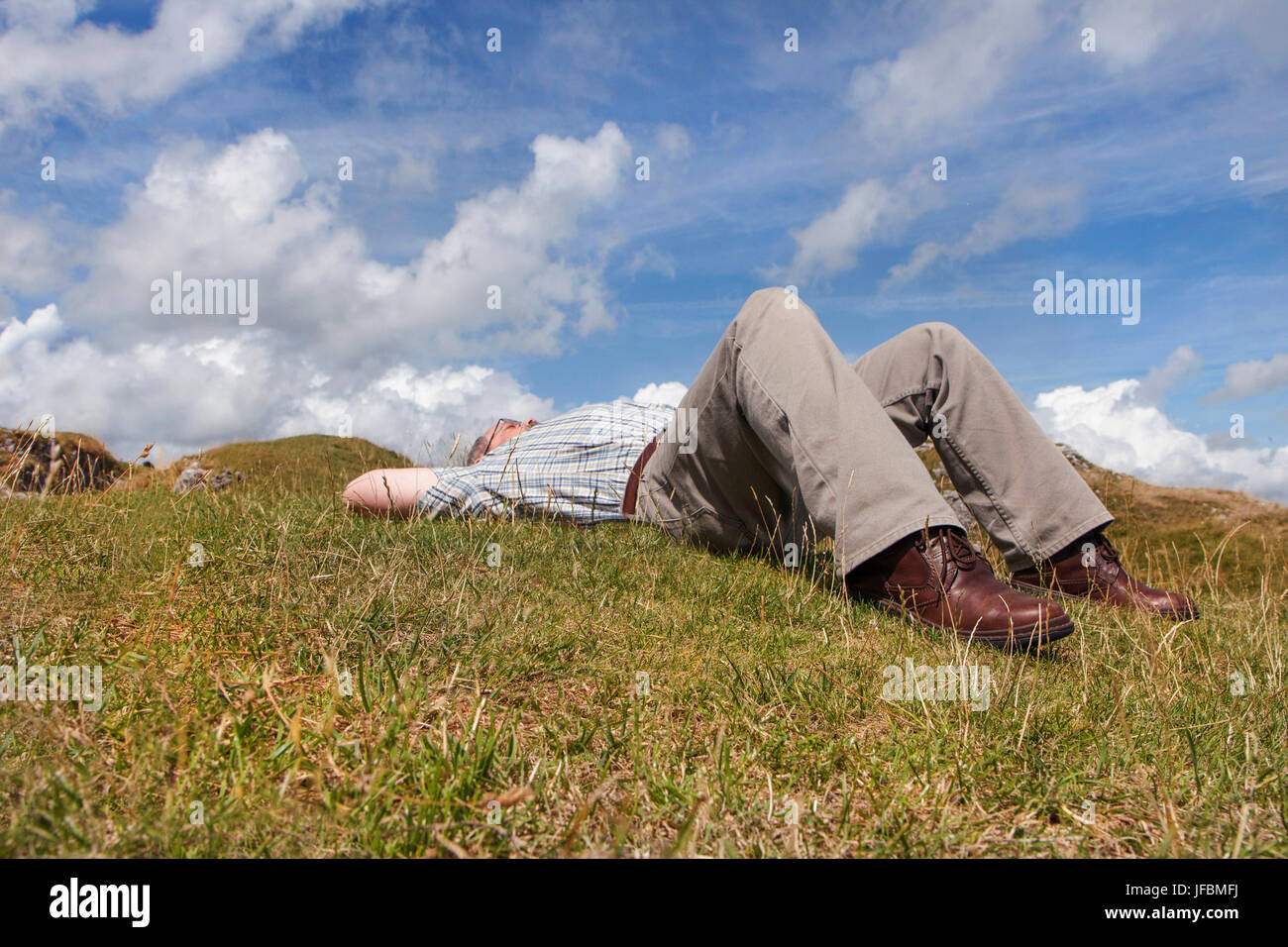 Mature Man Sleeping in the Sun - Retirement Stock Photo