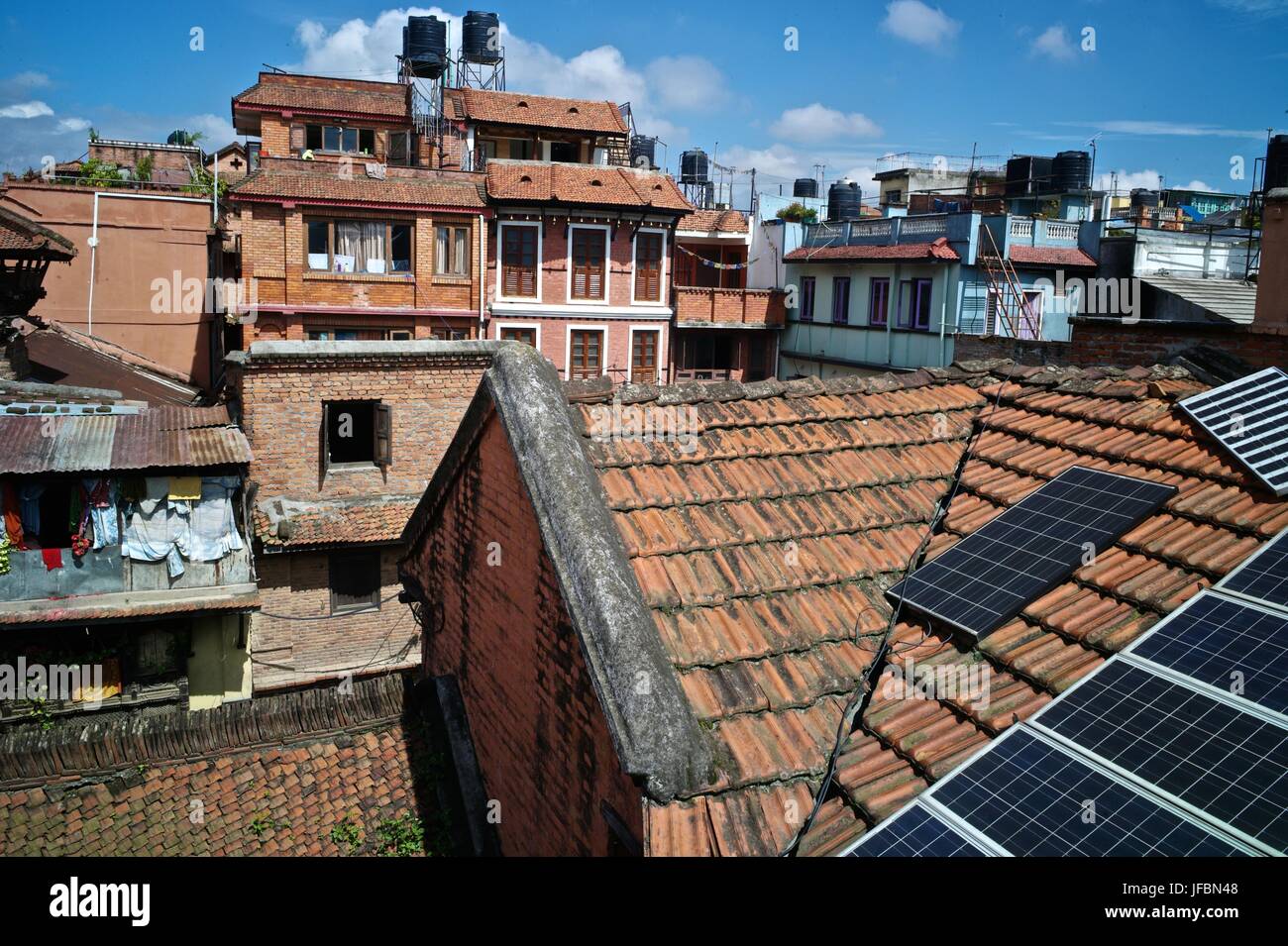 Solar panels on the roofs of Patan, a World Heritage Site. Stock Photo