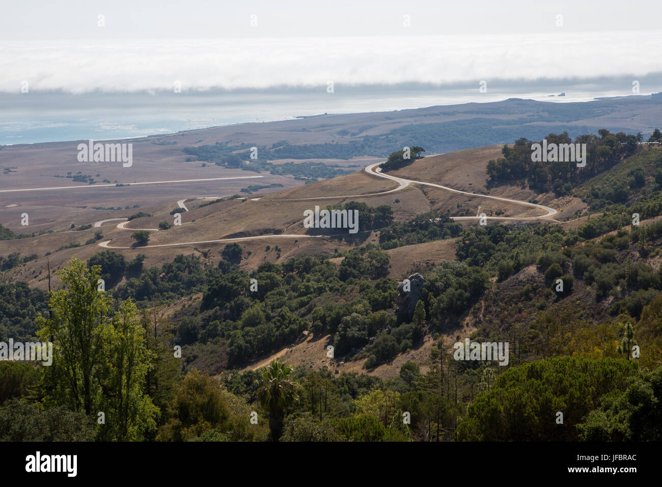 A view of the Pacific Ocean, the San Simeon coast, and the road leading to Hearst Castle. Stock Photo