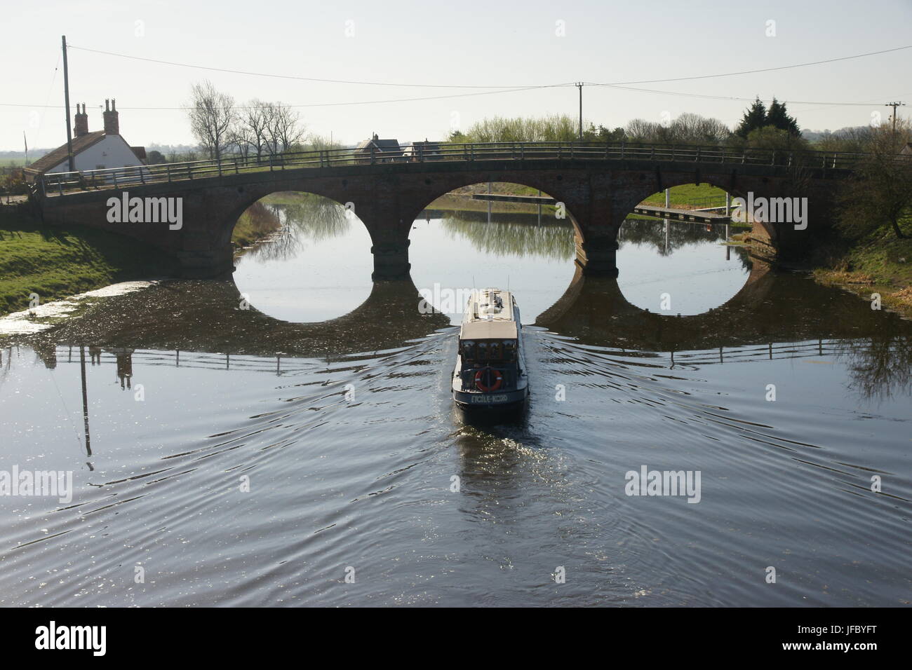 canal boat on the River Witham, tattershall bridge Stock Photo