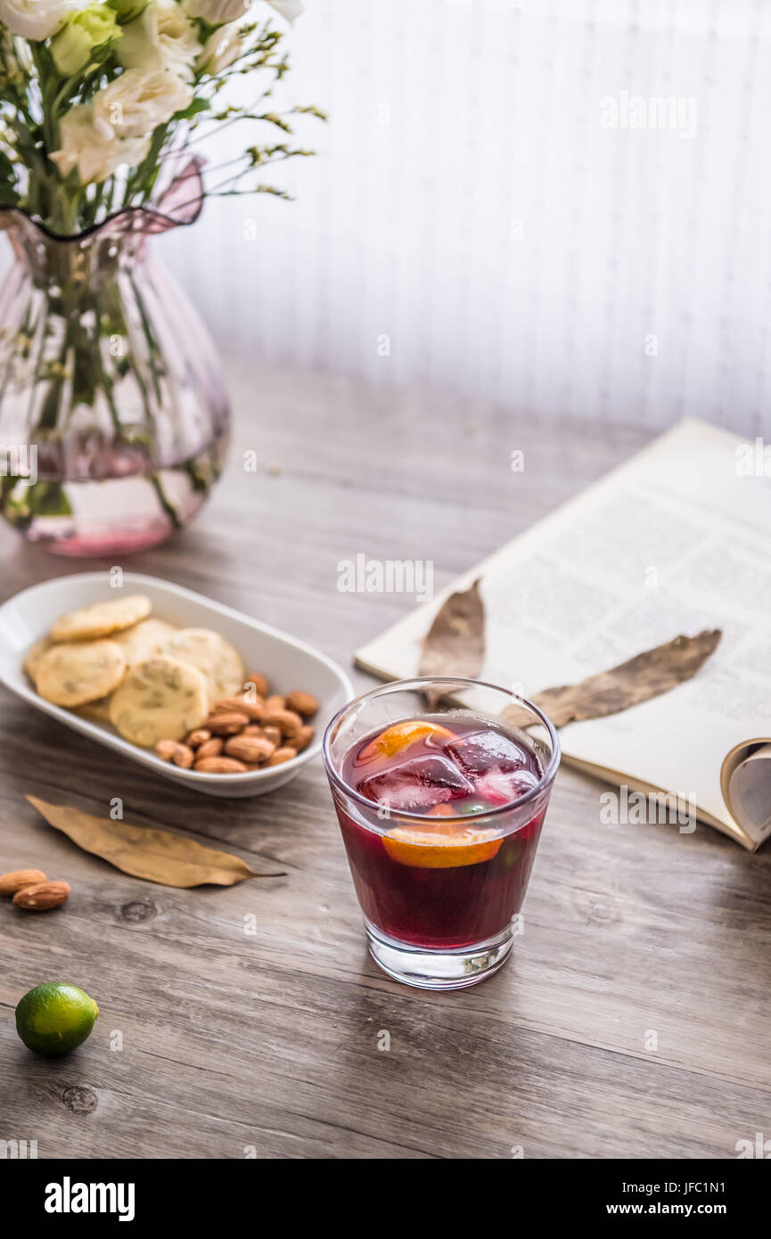 Desktop flowers and glass Stock Photo - Alamy