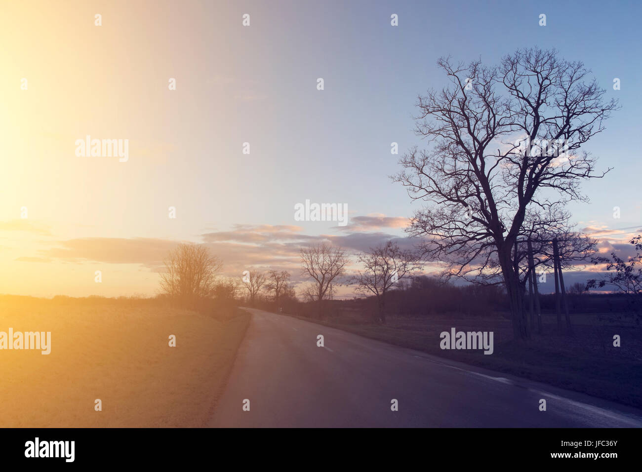 Asphalt road and sky Stock Photo - Alamy