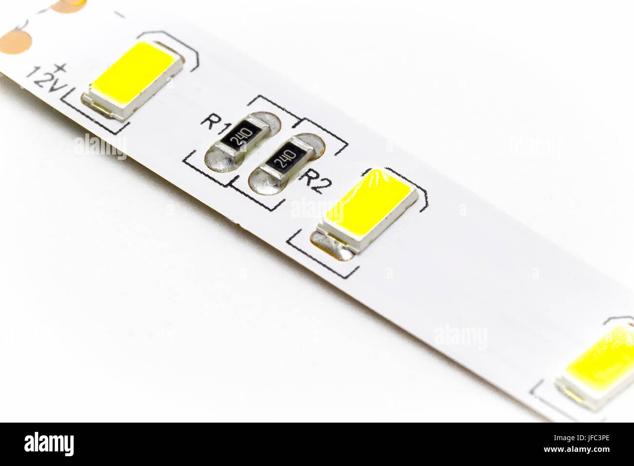 Part of the LED ribbon closeup on white background Stock Photo - Alamy