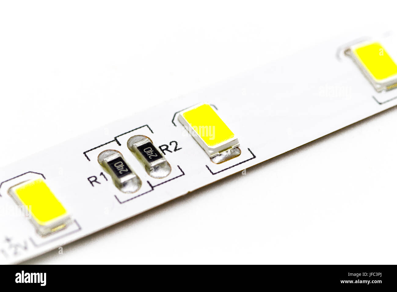 Part of the LED ribbon closeup on white background Stock Photo - Alamy