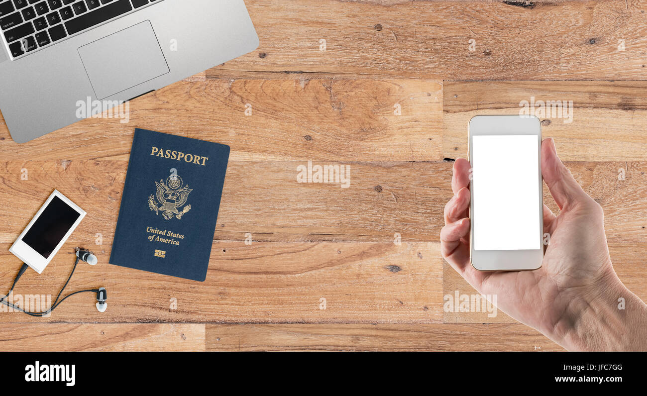 Clean wooden desk with travel equipment Stock Photo Alamy