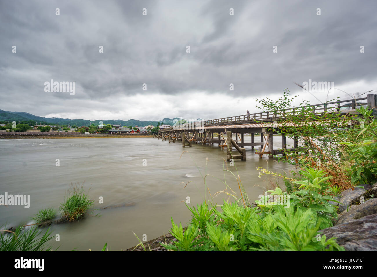 Wide angle long exposure of Katsura River and Togetsukyo Bridge in Arashiyama, Kyoto, Japan. Stock Photo