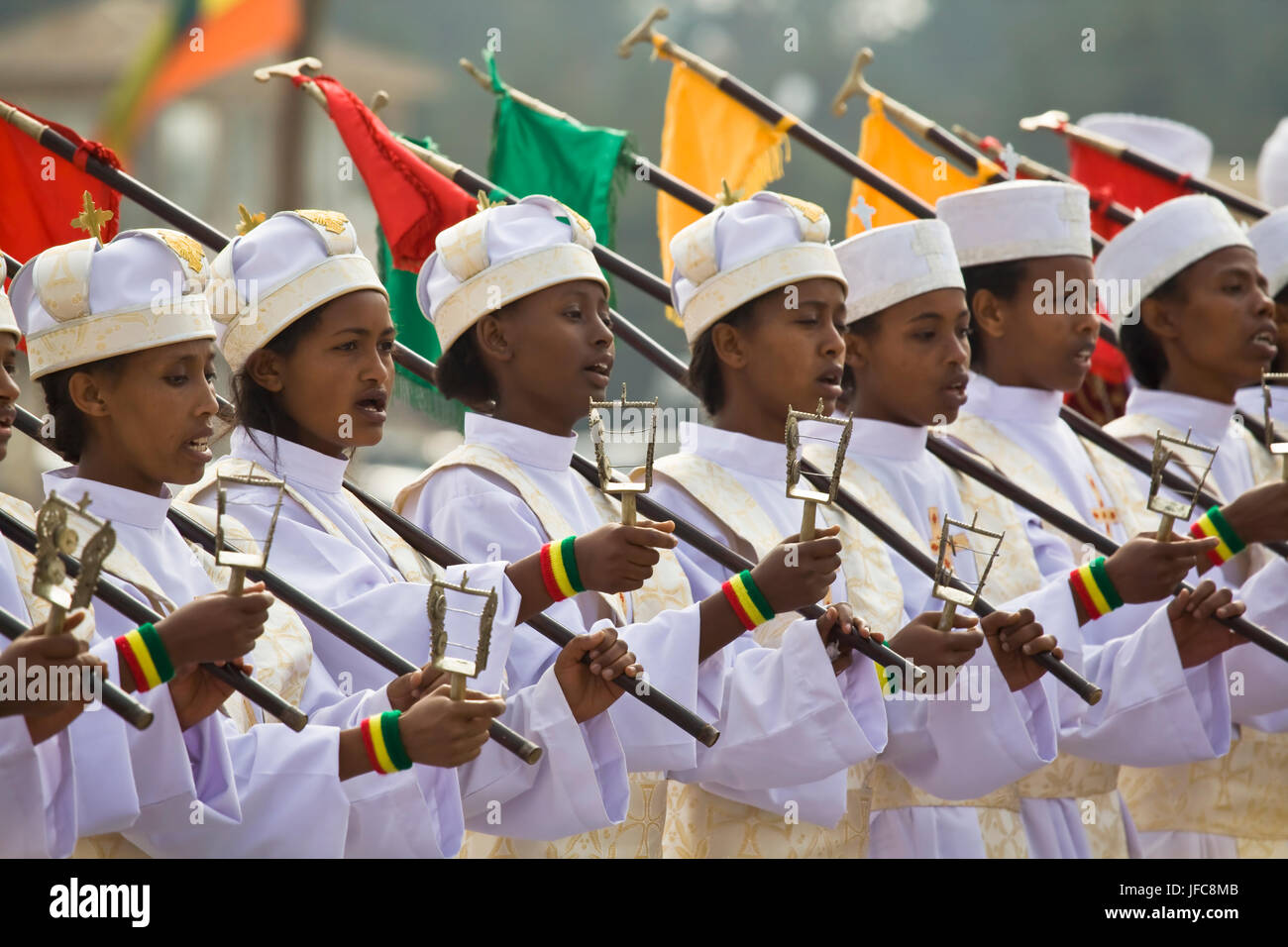 A group of young women is dancing with  liturgical instruments at the 2009 Timkat, the Orthodox Epiphany, in Addis Abeba, Ethiopia. Stock Photo