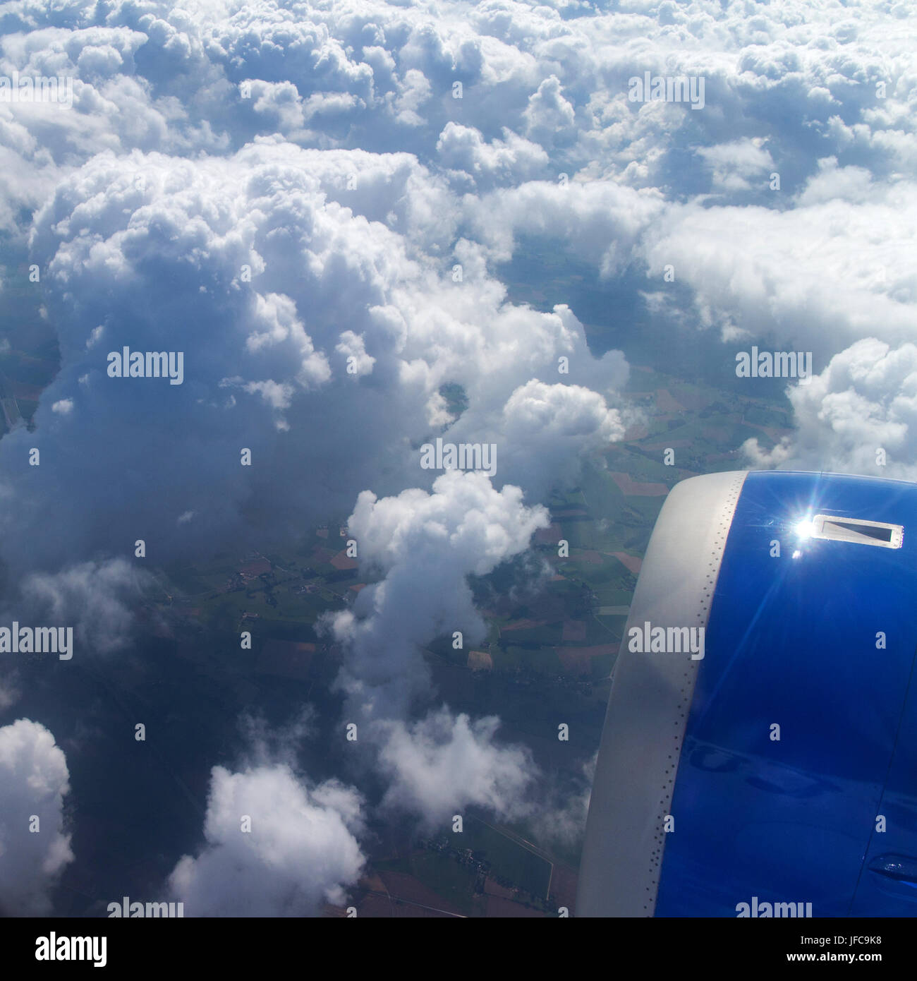 View of aircraft wing and engines in flight Stock Photo