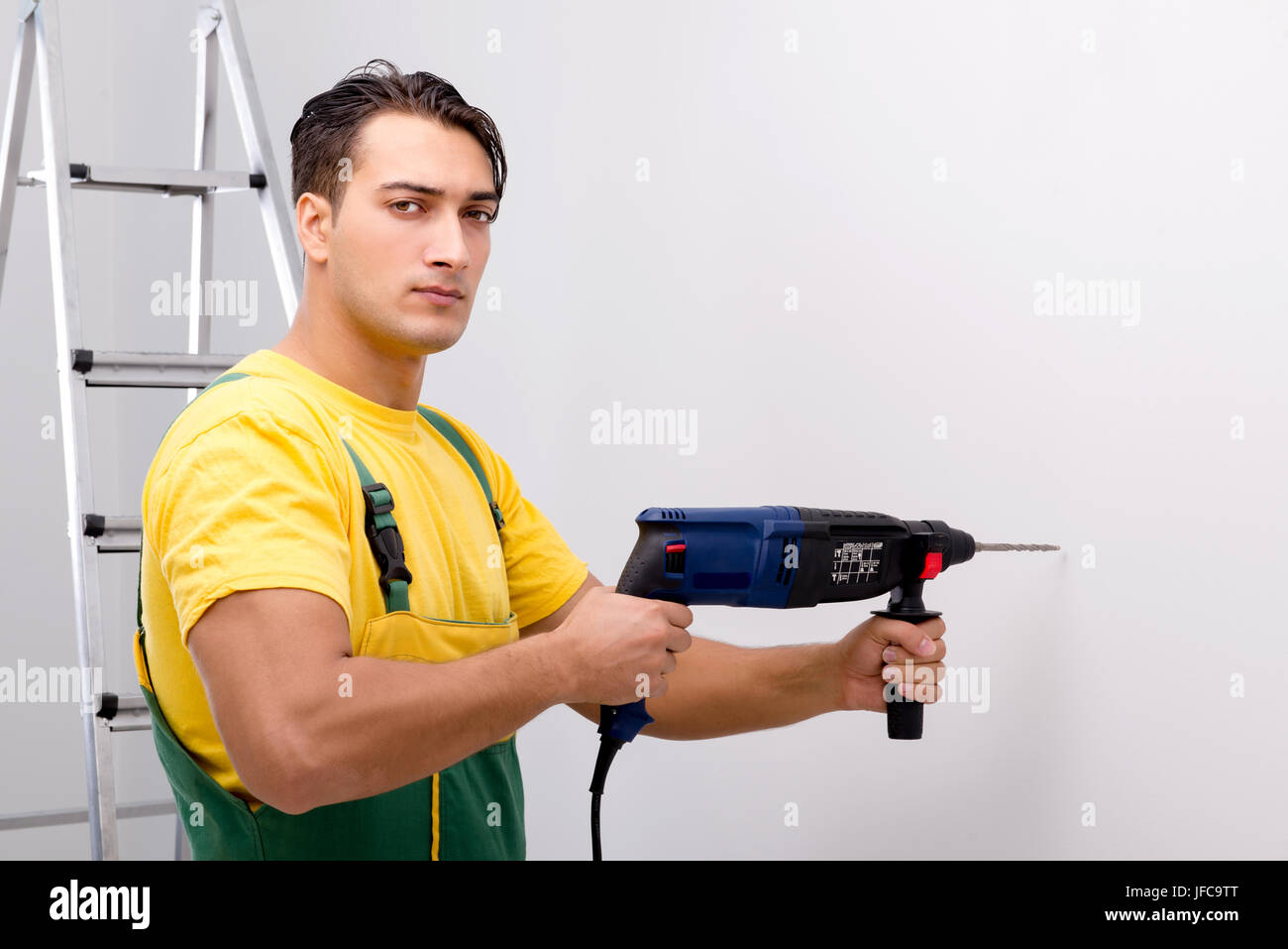 Construction worker working at the site Stock Photo - Alamy