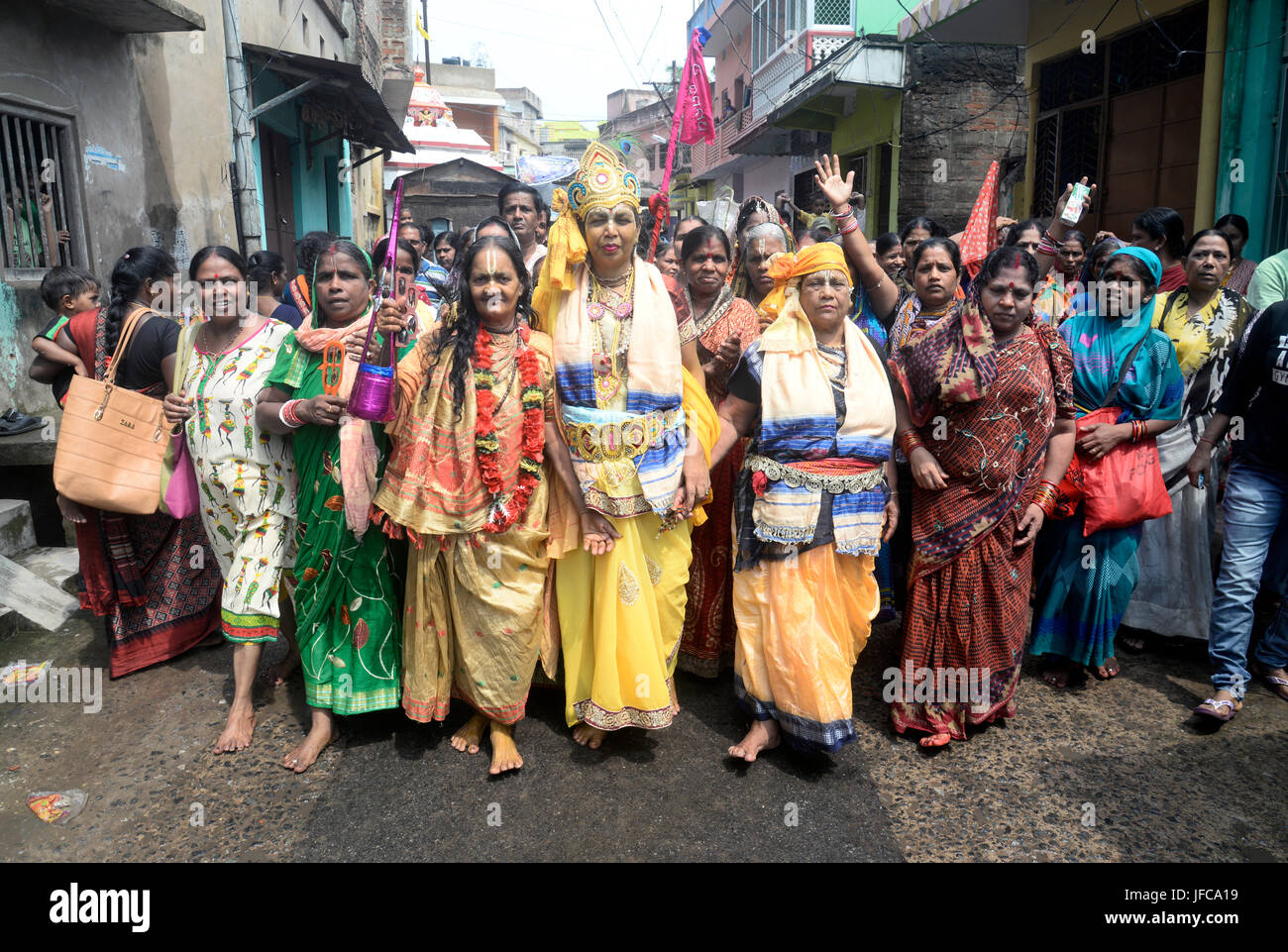 Hindu women devotees in Radha Krishna attire join the Ratha Yatra