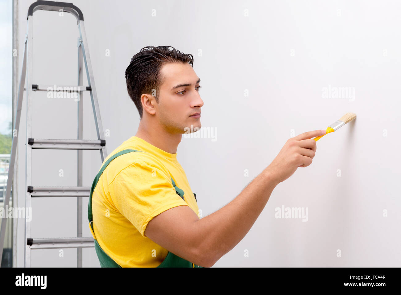Construction worker working at the site Stock Photo - Alamy