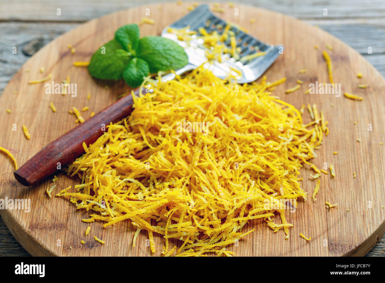 Wooden cutting board with grated lemon peel Stock Photo Alamy Wooden cutting board with grated lemon peel Stock Photo Alamy