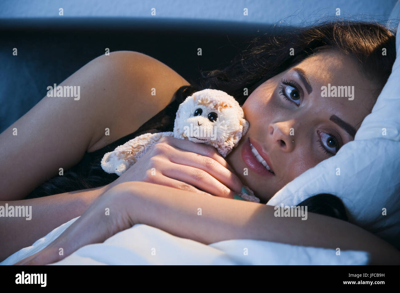 woman with soft toy Stock Photo