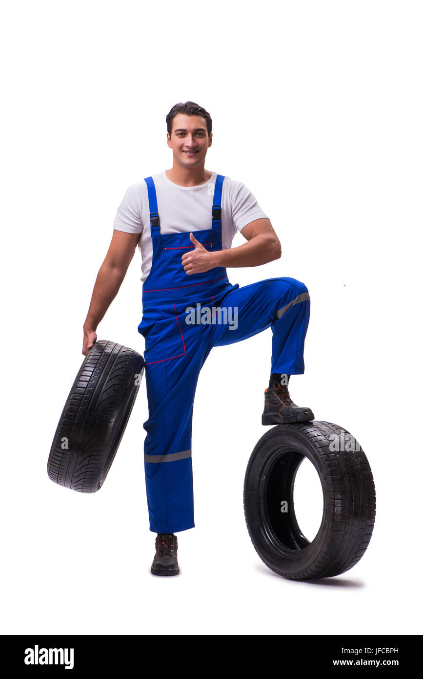 Handsome tyre repairman isolated on white Stock Photo