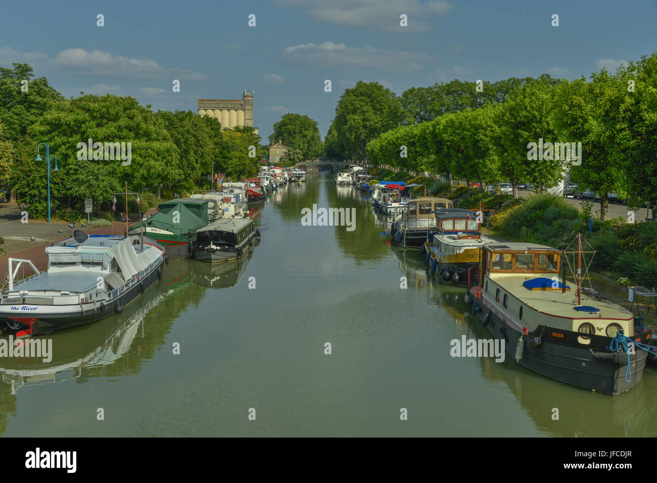The French city of Moissac and the river Garonne in Occitanie. Stock Photo