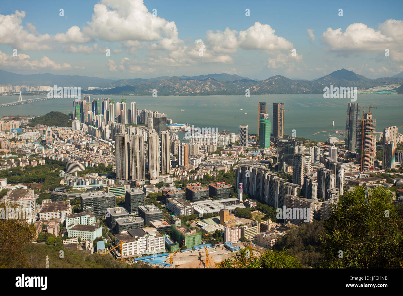 Shenzhen, Guangdong, People's republic of China; Aerial view at city landscape from Nanshan mountain; Nanshan munciipality; Stock Photo