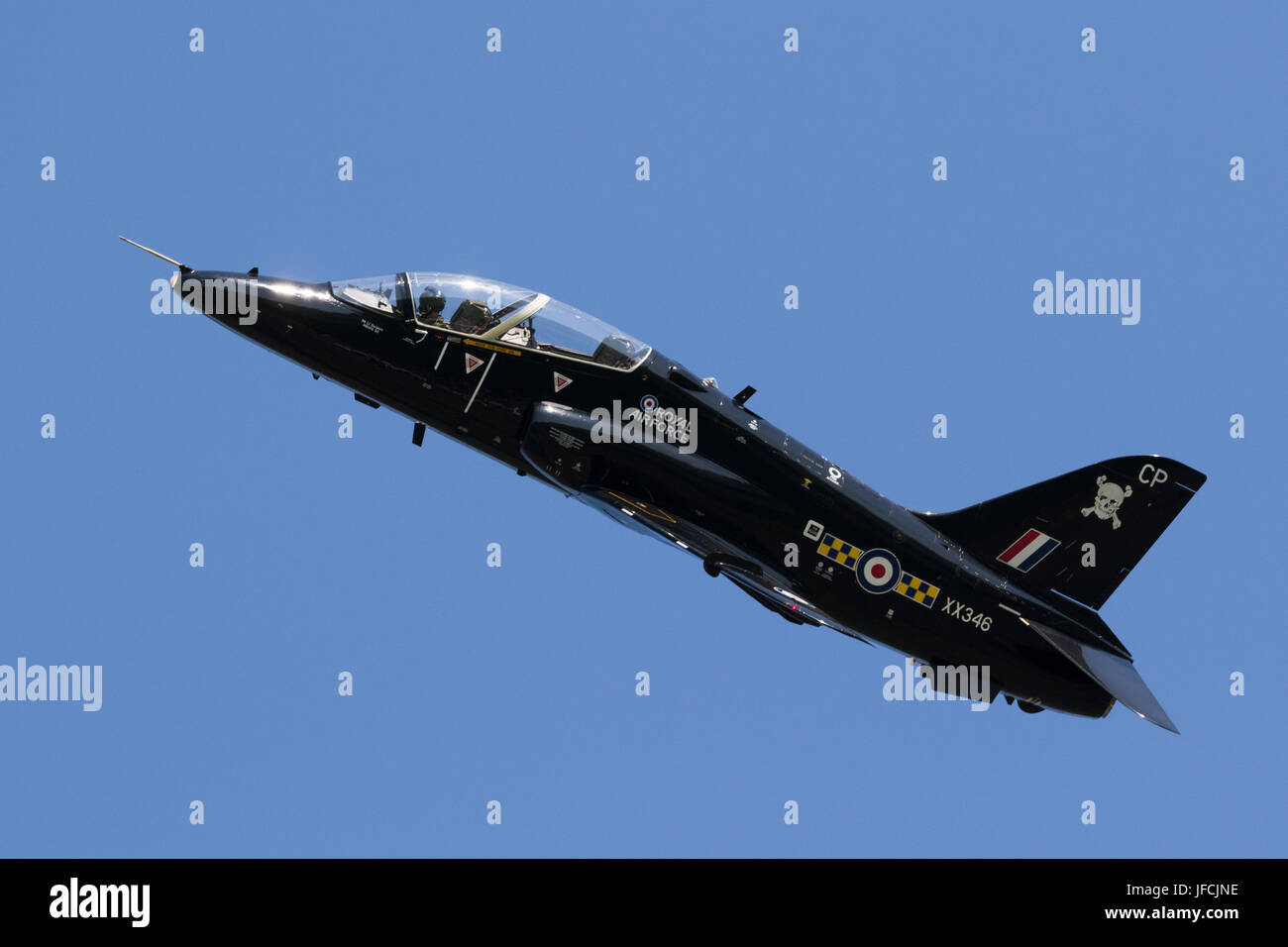 FLORENNES, BELGIUM - JUN 15, 2017: Royal Air Force BAe Hawk T1 trainer jet flying by over Florennes Airbase. Stock Photo