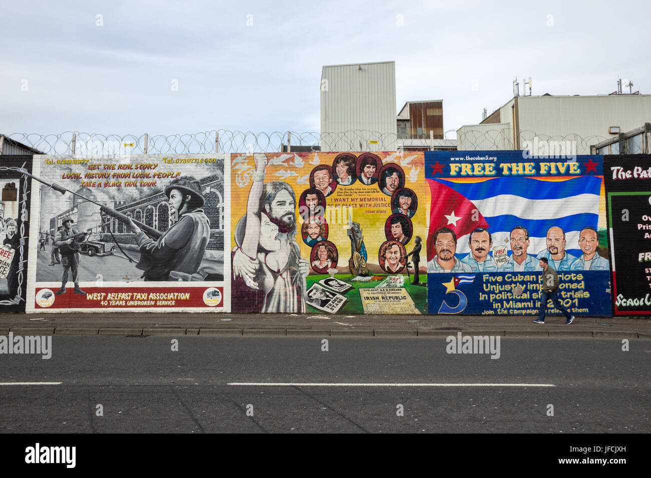 BELFAST, NORTHERN IRELAND - FEB 9, 2014: Political mural in Belfast, Northern Ireland. Falls Road is famous for its political murals. Stock Photo